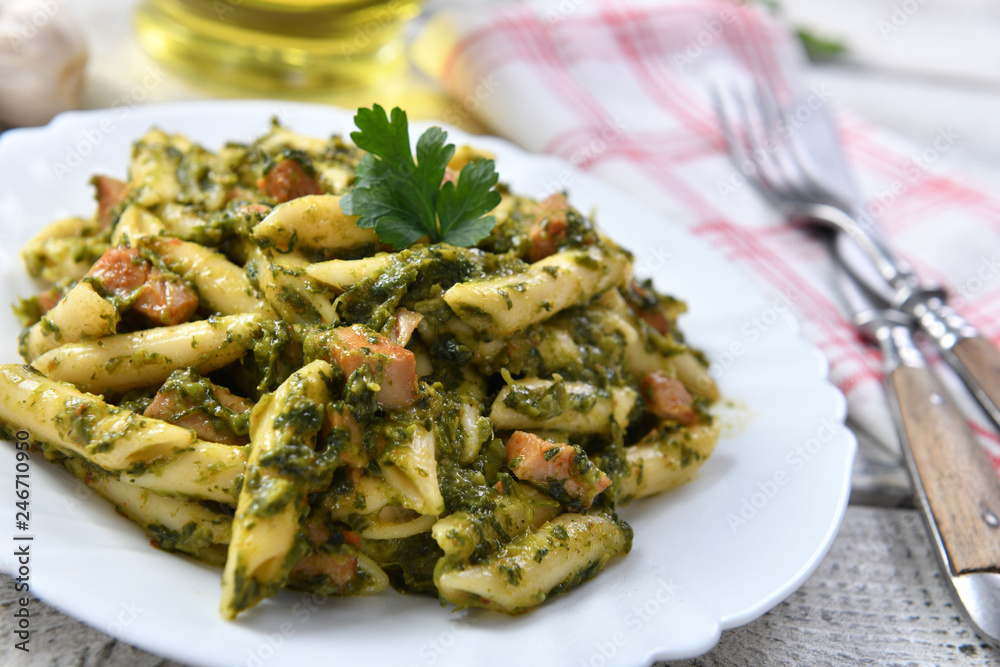 Penne pasta with spinach and meat