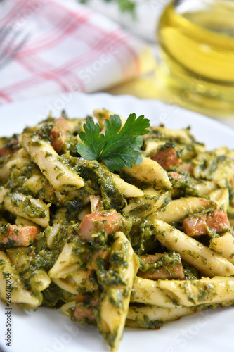 Penne pasta with spinach and meat