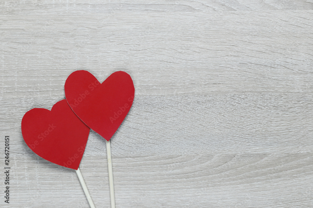 Red Heart paper on the wooden floor and have copy space.