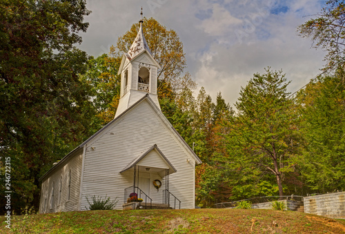 Little white country church at the break of fall.