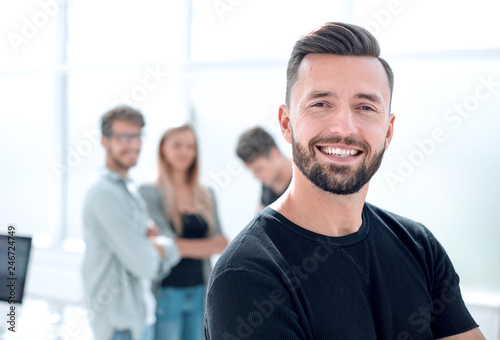 young man in black T-shirt smiling