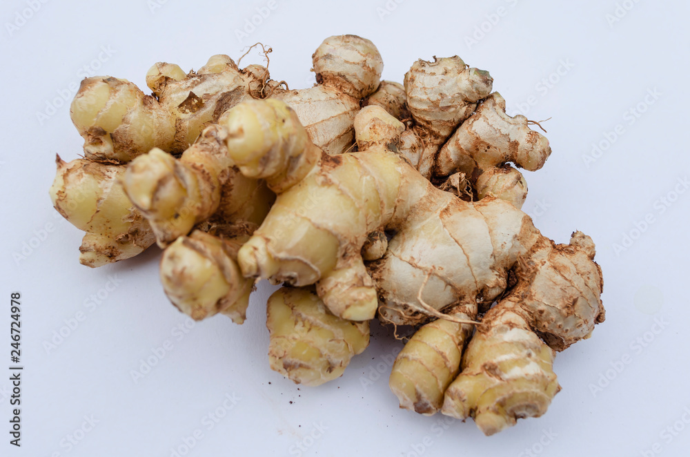 Fresh Ginger Root On White Background Fresh Ginger Root On White Background