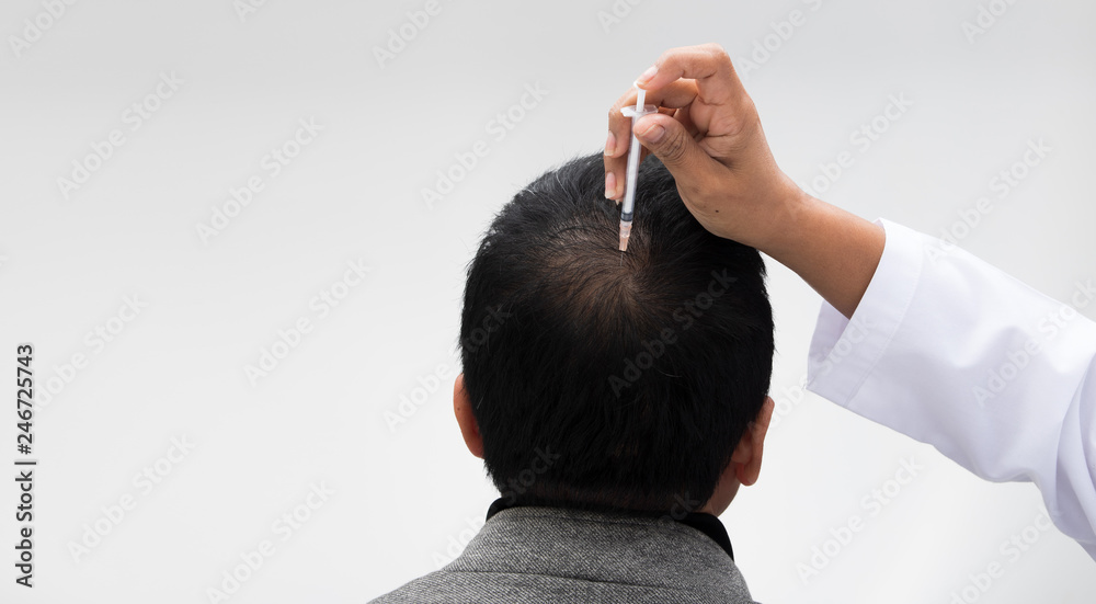 Aesthetics Doctor inject treatment serum vitamins to hair fall area on head by Syringe, Short Hair Loss control therapy clinic to prevent falling in working senior man woman, studio lighting isolated Stock Aesthetics Doctor inject treatment serum vitamins to hair fall area on head by Syringe, Short Hair Loss control therapy clinic to prevent falling in working senior man woman, studio lighting isolated Stock