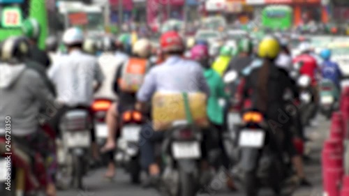 Wallpaper Mural HO CHI MINH,  VIETNAM - CIRCA NOVEMBER 2018 : Blurred view of HEAVY RUSH HOUR TRAFFIC.  Many MOTORBIKE RIDERS on the busy road. Torontodigital.ca