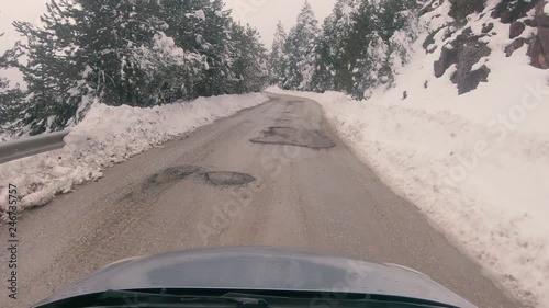 Driving on a snowy mountain road to Ziria ski center in Greece. photo