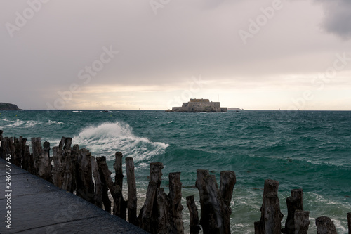 The beach and Fort National during high tide in Saint Malo