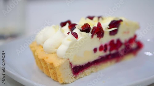 Wallpaper Mural On a plate a piece of cheesecake with cranberries. It is ready to eat Torontodigital.ca