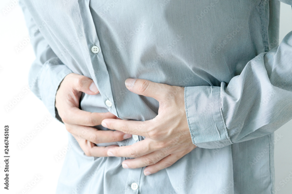 People have abdominal pain. Take a hand from the belly diarrhea.Health concept People have abdominal pain. Take a hand from the belly diarrhea.Health concept