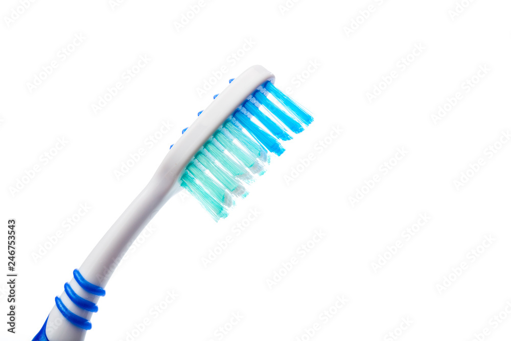 colored toothbrush on an isolated background, close up colored toothbrush on an isolated background, close up