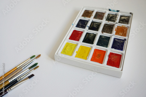 palette with brush and paints