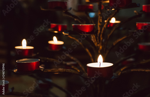 Small fired candles in a church
