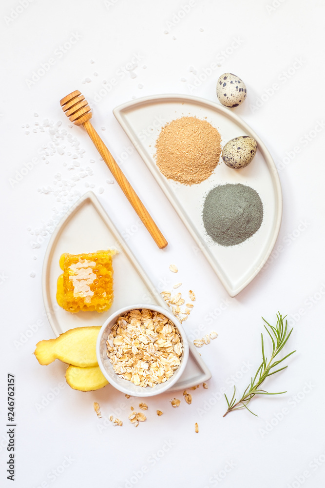 Minimalistic set of ingredients for making homemade organic natural cosmetics. Top view, flat Minimalistic set of ingredients for making homemade organic natural cosmetics. Top view, flat