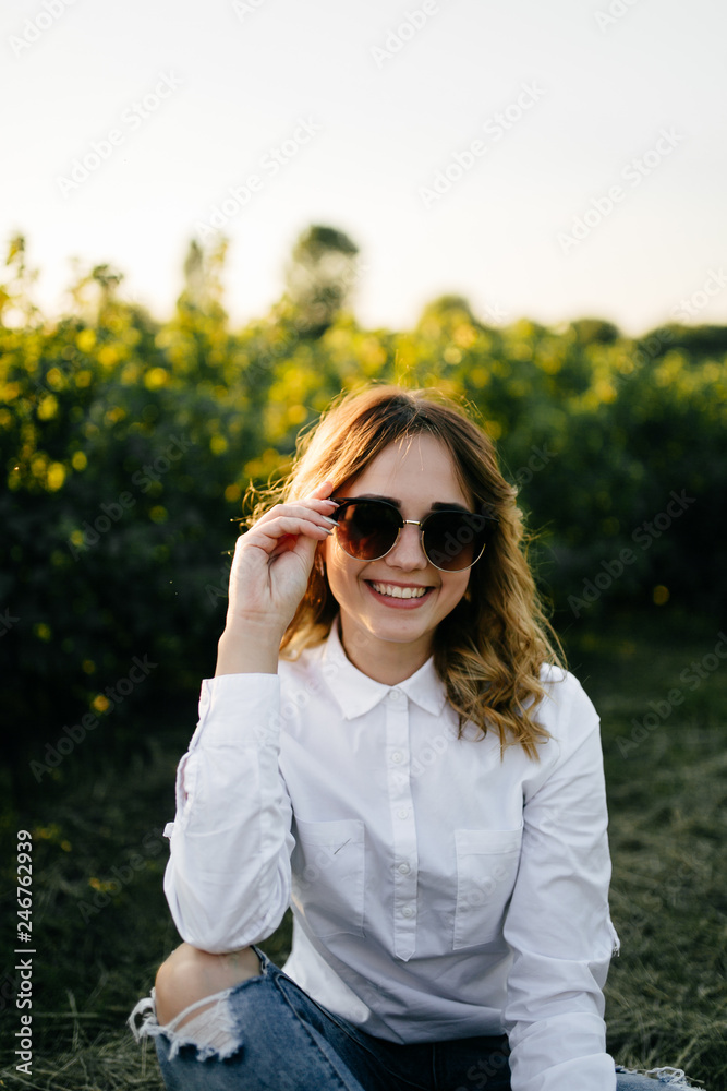 A girl in a hat on a walk in the park A girl in a hat on a walk in the park