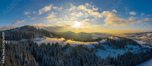 Fototapeta Naklejka Na Ścianę i Meble -  Panoramic view of the winter mountains. View from above. Landscape photo captured with drone. Silesian Beskids, Poland, Europe.