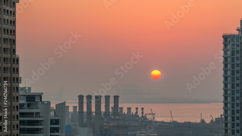 Aerial view of Dubai Marina from a vantage point at sunset timelapse.