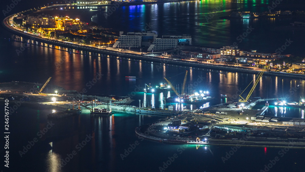 Aerial view of Palm Jumeirah Island night timelapse.