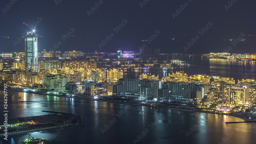 Aerial view of Palm Jumeirah Island night timelapse.