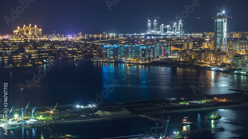 Aerial view of Palm Jumeirah Island night timelapse.