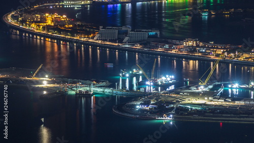 Aerial view of Palm Jumeirah Island night timelapse. © neiezhmakov