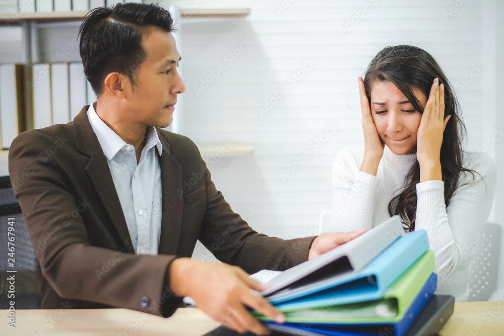 colleagues worry and boring about her over work from manager at office colleagues worry and boring about her over work from manager at office