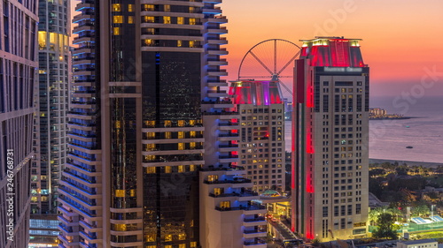 Photography JBR and Bluewaters island after sunset aerial day to night timelapse