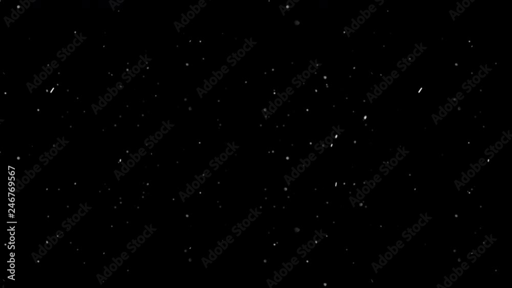 Floating particles on black background. Slow motion. Floating particles on black background. Slow motion.