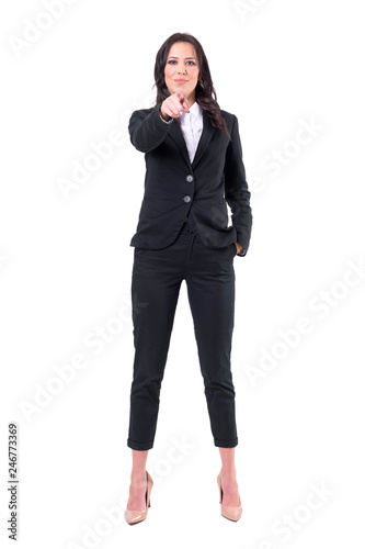 Successful confident happy business woman pointing finger choosing you to join company. Full body isolated on white background. 