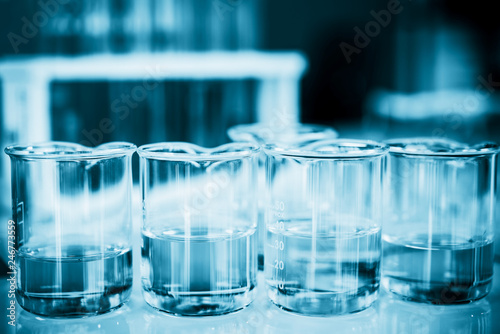 Laboratory glassware in blue tone 