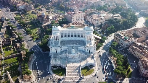 Aerial drone roatational video of iconic neoclassic building of Altar of the Fatherland - Altare della Patria, known as the national Monument to Victor Emmanuel II, Rome, Piazza Venezia, Italy photo