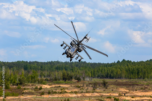 Fighting helicopter in military training Saber Strike in Latvia.