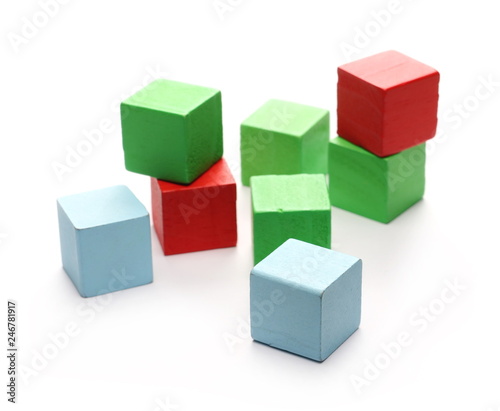 Wooden colorful building blocks for children  tower games isolated on white background