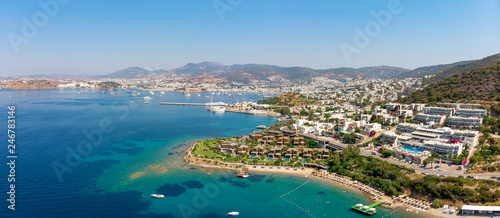 Panoramic aerial view of sunny Bodrum with resorts and beachfront villas
