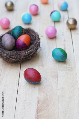Decorative colorful painting easter eggs in nest, fun event activity for kid concept