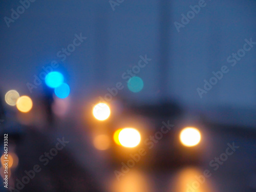 Defocused traffic lights in a foggy morning - bokeh effect © Viesturs