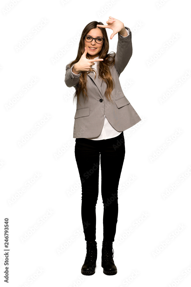 Full-length shot of Business woman focusing face. Framing symbol on isolated white background Full-length shot of Business woman focusing face. Framing symbol on isolated white background