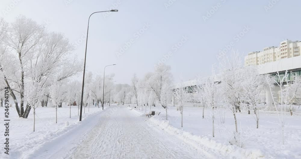 Snow-covered city park