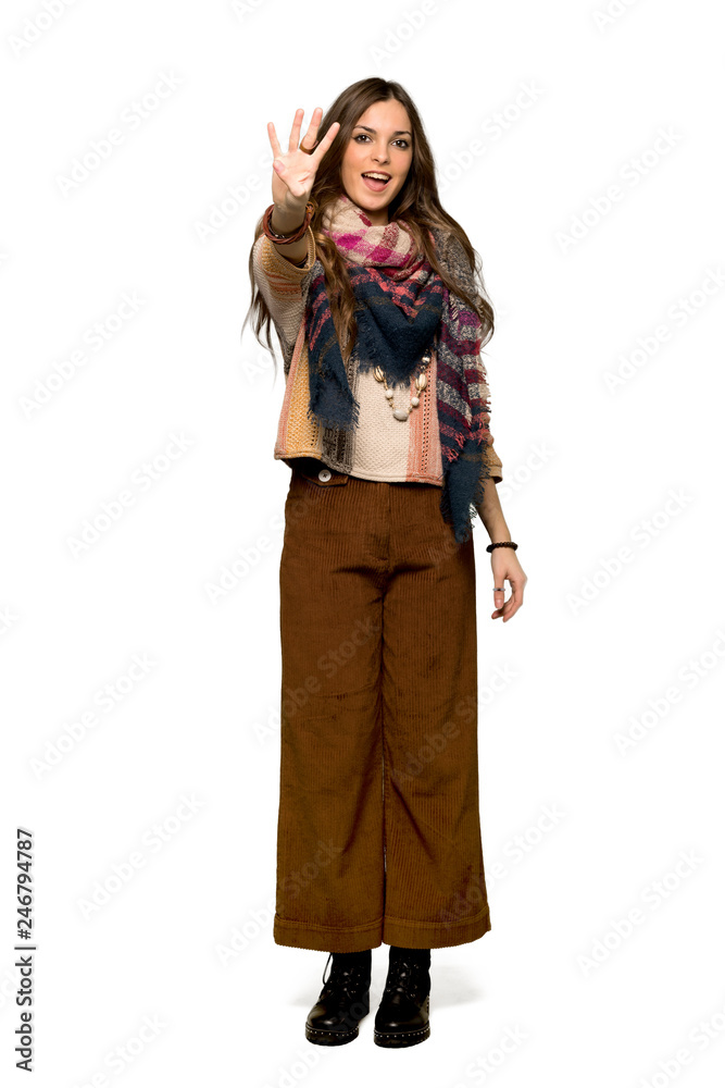 Full-length shot of Young hippie woman happy and counting four with fingers on isolated white background Full-length shot of Young hippie woman happy and counting four with fingers on isolated white background
