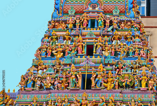 Photography Colorful Sculpture, architecture and symbols of Hindu temple at Singapore , Sri Veeramakaliamman Temple with modern architecture in background