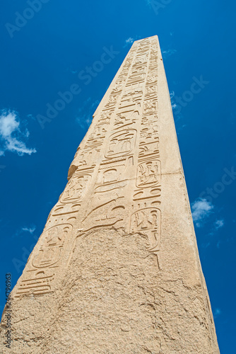 Obelisk with hieroglyphics and ancient egyptian Karnak Temple