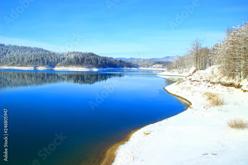 Winter landscape  Blue lake covered with snow  Gorski katar  Croatia