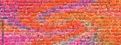 Multicolor brick wall background. Colorful stonework texture.