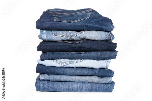 Jeans trousers stack on white background