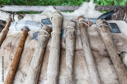 Fotografi Handmade stone age axes in a row