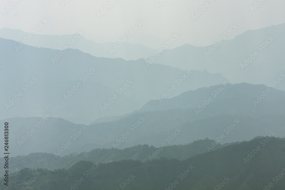 Landscape layers mountains in haze at Longshen China