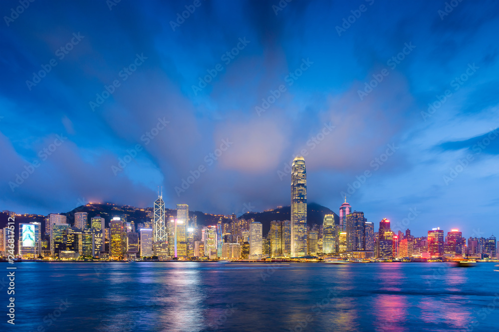 Hong Kong, China city skyline on Victoria Harbor at night.