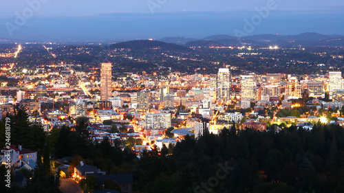 Aerial night view of Portland, Oregon city center © Harold Stiver