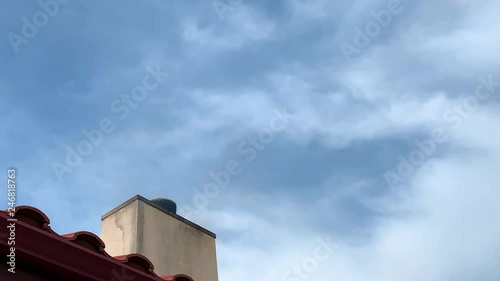 Smoke coming out of a chimney in a house on a chilly January day in Los Angeles. photo