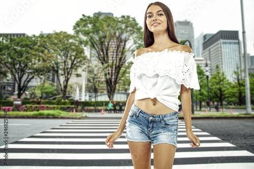 Slim young woman in city and spring time 