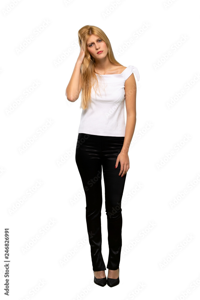 Young blonde woman unhappy and frustrated with something over isolated white background Young blonde woman unhappy and frustrated with something over isolated white background