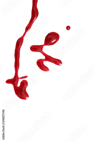 Drops of red liquid (blood, nail polish, ketchup, dressing) isolated on white background